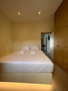 A bed or beds in a room at Sostis Sunrise Villa