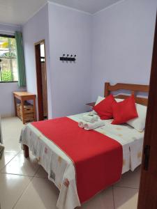 Cama ou camas em um quarto em Hotel Lumiar