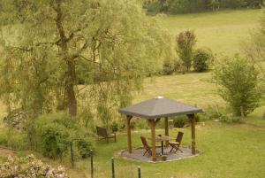 Aed väljaspool majutusasutust Le Clos Arboré (Gîte)