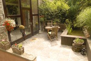 Aed väljaspool majutusasutust Le Clos Arboré (Gîte)