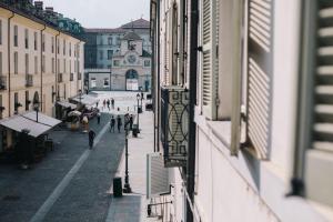 a view of a city street from a building at Le Dimore di Diana in Venaria Reale