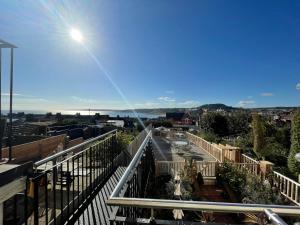 a view from the balcony of a house at Seascape Scarborough Stunning Seaview Holiday Home Apartment in Scarborough