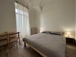 Postel nebo postele na pokoji v ubytování Al Belvedere Affittacamere