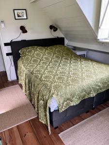 Postel nebo postele na pokoji v ubytování Lodge De Zandbalk