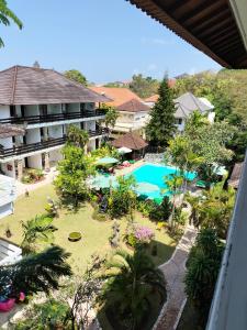 an aerial view of a resort with a swimming pool at Hotel Grand Kumala Bali in Legian