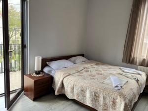 Guest House PIROSMANI客房内的一张或多张床位