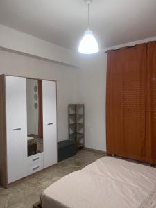 A bed or beds in a room at Il Fante locazione turistica