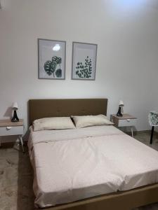 A bed or beds in a room at Il Fante locazione turistica