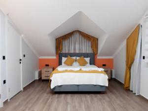 Postel nebo postele na pokoji v ubytování The Vineyard Hill Villa
