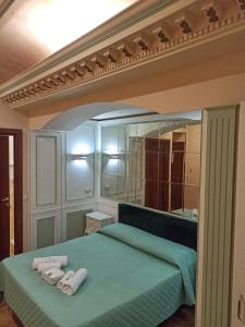 Letto o letti in una camera di Domina Popolo