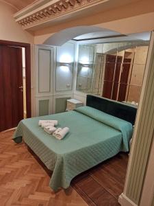 Letto o letti in una camera di Domina Popolo