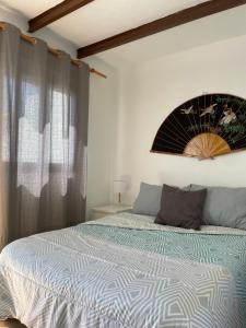Katil atau katil-katil dalam bilik di Sunset Dream, casa en la playa con terraza