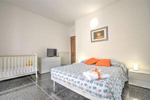 Een bed of bedden in een kamer bij Mariani's Home