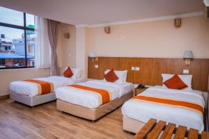 Cama o camas de una habitación en Hotel Fewa Camp