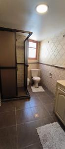 Vonios kambarys apgyvendinimo įstaigoje Caserita