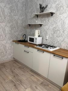 Η κουζίνα ή μικρή κουζίνα στο Квартира гостиничного типа VIP Jaŋa Qala