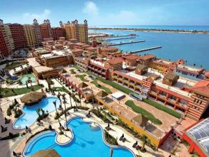 an aerial view of a resort with a water park at PORTO MARINA TOWERS SEA & POOL VIEW North Coast in El Alamein