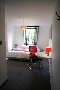 Ένα ή περισσότερα κρεβάτια σε δωμάτιο στο Hotel Restauracja Venus
