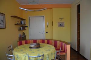 a dining room with a table with a bowl on it at Casa Benny in Milan