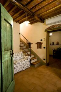 Postel nebo postele na pokoji v ubytování Agriturismo Podere Luisa