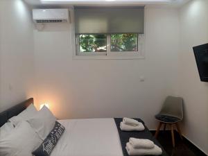 A bed or beds in a room at Central Bachelor