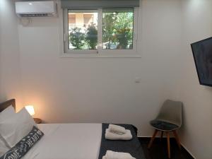 A bed or beds in a room at Central Bachelor