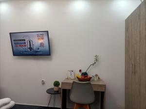 A television and/or entertainment centre at Central Bachelor