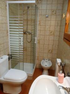 Koupelna v ubytování Casa Quini + 7 fotografií