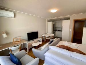 Posteľ alebo postele v izbe v ubytovaní Estudio céntrico 2 con terraza y parking privado