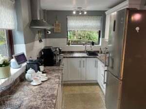 Köök või kööginurk majutusasutuses Muddy Paws Cottages - The Nook