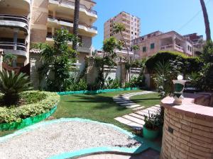 a garden in the middle of a building at Agami Guest House in Alexandria