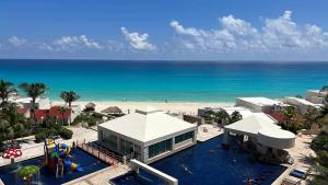 an aerial view of a resort on the beach at Solymar condos on the beach in Cancún