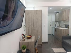 A kitchen or kitchenette at Central Bachelor