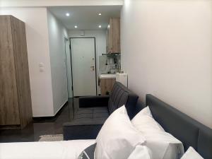 A bed or beds in a room at Central Bachelor