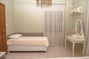 Postel nebo postele na pokoji v ubytování Silia's Secret Place