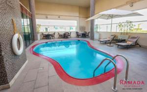 The swimming pool at or close to Ramada Downtown Abu Dhabi