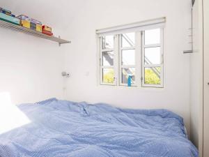 Postel nebo postele na pokoji v ubytování Holiday home Grenaa L