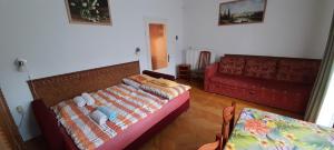Voodi või voodid majutusasutuse Orchidea Apartman toas