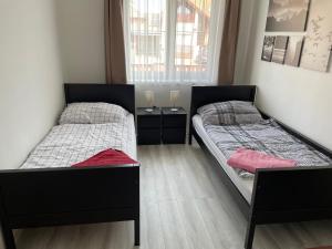 Posteľ alebo postele v izbe v ubytovaní K33