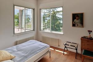 Postel nebo postele na pokoji v ubytování Casa Navegna + 22 fotografií