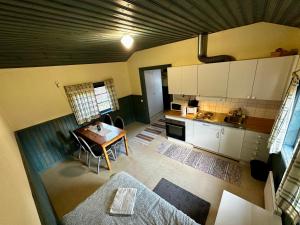 Kuchyň nebo kuchyňský kout v ubytování Ramsjö Camping Stuga