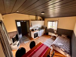 Kuchyň nebo kuchyňský kout v ubytování Ramsjö Camping Stuga