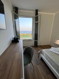 Postel nebo postele na pokoji v ubytování Maison Butera