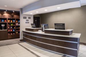 a lobby with a cash counter in a store at Residence Inn Denver Southwest/Lakewood in Lakewood