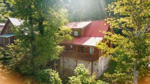an aerial view of a house with a red roof at Baloo's Bungalow in Gatlinburg