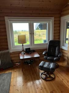 Posezení v ubytování Luxury cottage located in the Golden Circle, mountain view!