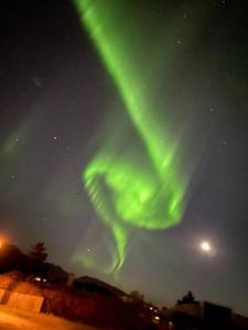 an image of the northern lights in the sky at Luxury cottage located in the Golden Circle, mountain view! in Laugarvatn