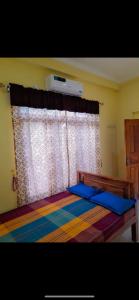 Postel nebo postele na pokoji v ubytování Zayan Holiday Inn