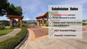 een bord voor een huis bij Villa Mercedita Subdivision - Centralized Aircon at Gene Vacation Homes in Davao City