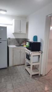 Kuchyň nebo kuchyňský kout v ubytování Sencillo PH céntrico de Marcela sin garage sin cargos